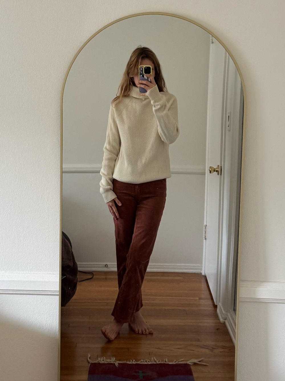 Cream ribbed knit turtleneck sweater
